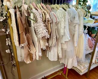 Client was a photographer specializing in photographing infants. The sale is full of beautiful clothes and accessory for infants