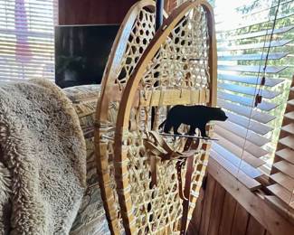 close up of snowshoe floor lamp