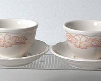 Two Homer Laughlin cups and saucers