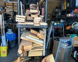 Shelves of misc. wood moulding and planks