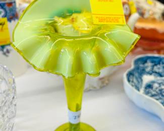 Lovely Vaseline glass vase.              Several ways to bid! We offer absentee bidding, telephone bidding, leave and absentee bid on Hibid or bid in Realtime on Hibid Selling platform under Garrett and Garrett Auction Co      Better yet, Come See Us!                                                  Garretts tel:  850-244-7453