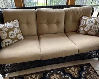 Sunbrella All Weather Wicker in a basketweave pattern Sofa.