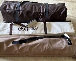 Camping Cot and tent, plus yard game.