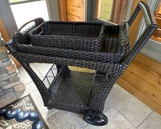 Sunbrella Rolling Wicker/Basket Style Patio Cart with removable trays.