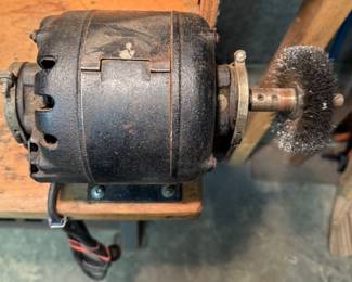 Bench Motor With Buffing Implement