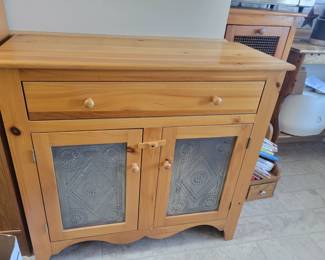 Tin punched cabinet