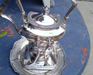 Silver plate kettle on stand