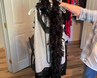 flapper outfit .. also have an overcoat for a flasher costume.. get a battery operated light with a speedo. Yaha!!