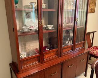 Asian hutch with 4 glass doors and 4 cabinets