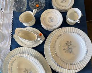 Pretty blue rose dishware, plates, bowls, gravy boat, creamer pitcher, tea cups, saucers, glass decanter, glass mug, glass candy dish
