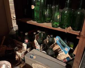 Tons of empty soda and liquor bottles, ask an employee. They are in a closed off area. 