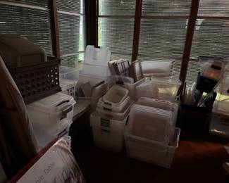 Tons of large, medium and small plastic totes and lids. 