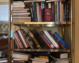 Books and two brass ettigeres 
