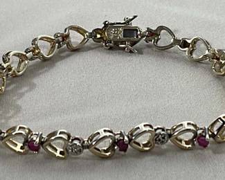 Heart Design Bracelet With Ruby Diamond Like Stones