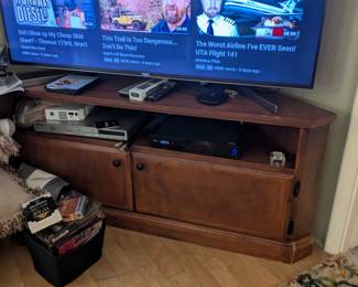 Spec built corner cabinet for TV and accessories. TV not for sale