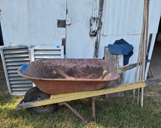 Old wheel barrel...might make a unique planter