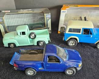 Three Ford Die Cast Trucks