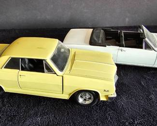 Two Malibu Die Cast Cars