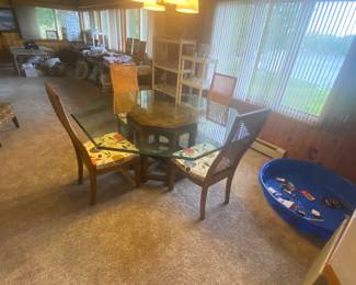 Hendredon glass top table and 8 cane back Thomasville chairs. $900