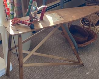 Vintage child’s ironing board from Saginaw  $60.   Child’s electric iron $20