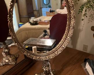 Oval mirror on stand. Very unique and beautiful 