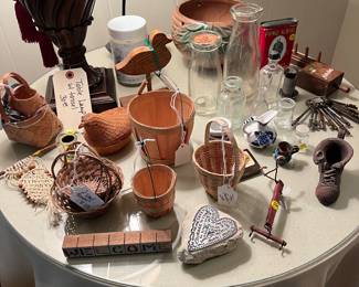 Assorted items and lots of clear glass collectible bottles. 