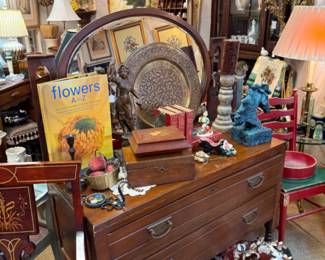vanity with oval mirror on swivel, brass tray, brass statuary, horse head decorative piece, lamps, pretty chair