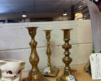 brass candlestick and vintage planters