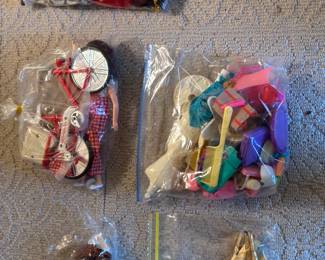 Vintage children’s dolls and clothing
