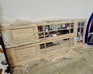 Double antique French doors with glass paneling. Comes as a set with frame and included glass over door . Incredibly heavy . Authentic 