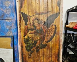 Reclaimed hand painted door. Used as art but could be multi functional 