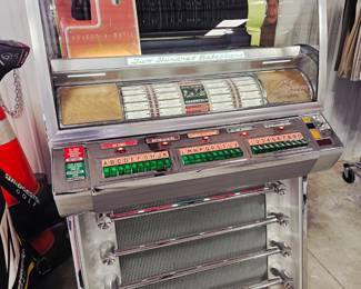 Completly restored  Seeburg VL200 Jukebox, also known as the Seeburg V-200 Select-O-Matic.  Currently has issue with button popping up after selection is made. Will need repair. Otherwise in excellent condition 