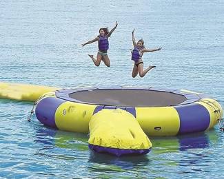 130" lake gladiator  trampoline with launch pad. Unknown condition once blown up. *********The following photo is not a exact photo of this item it is meant for demonstration purposes only for what this will look like when it is inflated 