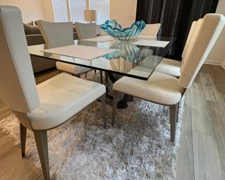 ELEGANT LARGE GLASS TABLE 
WITH 6 WHITE LEATHER CHAIRS
    1,000