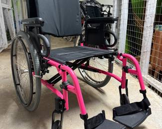 Quickie QXI lightweight wheelchair, bright pink and barely used. Comes with seat pillow (not pictured)