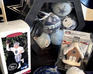 Dallas Cowboys memorabilia - pillows, blankets, games, clothes, kitchen items, and Christmas decor.