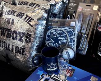 Dallas Cowboys memorabilia - pillows, blankets, games, clothes, kitchen items, and Christmas decor.