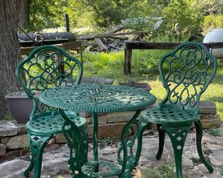 WROUGHT IRON TABLE AND CHAIRS