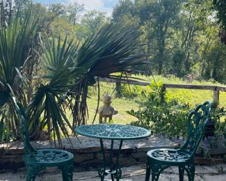 WROUGHT IRON TABLE AND CHAIRS
