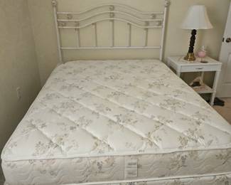 We have two queen beds and one king bed at this sale. Here is the mattress without anything on it. $200 ( comes with metal headboard) all of our mattress sets are practically new.