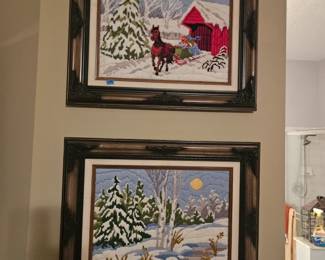 Set of two needlepoint winter time framed, our client's wife did all of the handmade window tapestries in this house and this is some of her work as well. $50 for the pair framed