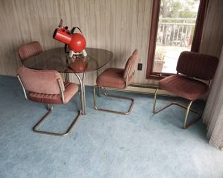 Glass top dining set seats 4; telescope