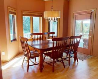 Beautiful Nine and half foot Dining Room Table with 10 Chairs