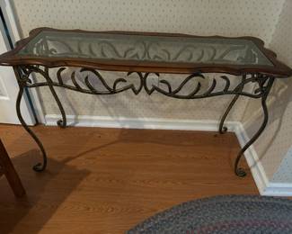 Glass top sofa table.