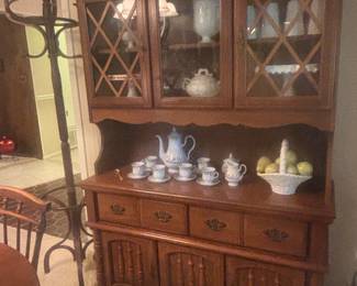Lighted china hutch, coat rack,ceramic bowl w pears, milk glass pitcher and glasses and tea set