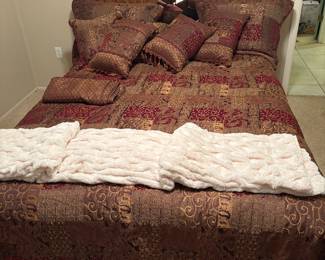 Queen size bed w headboard, mattress and boxed springs. Several comforter sets to choose from