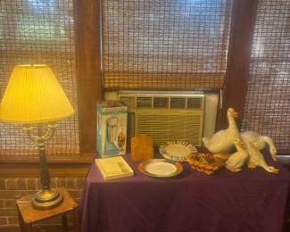 A/C not for sale. Lamp, small side table, ceramic ducks, etc