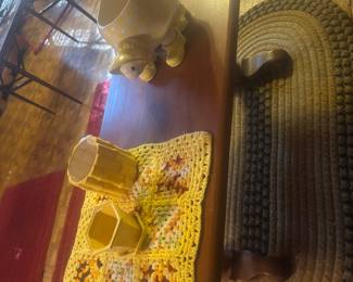 Coffee table, ceramic planter and small crochet item