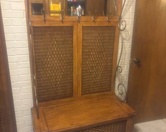 Utility room piece for coats, hats, etc. bottom opens up for storage