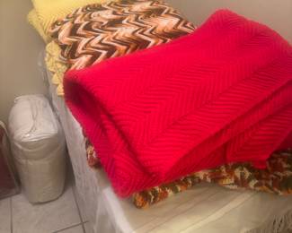 Several handmade crochet blankets